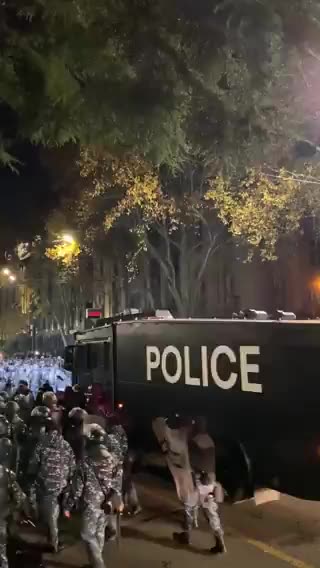 Massive number of Georgian riot police moving toward pro-EU protesters in Tbilisi.