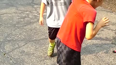 Boy Tries To Race With Shirt Attached To Gate