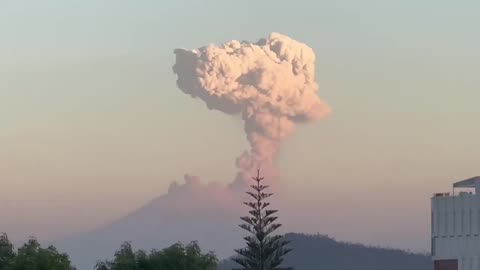 Volcano near Mexico City erupts, releasing towering plume of ash