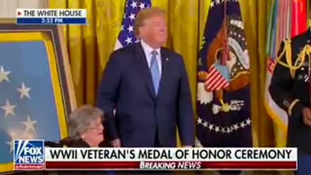 Trump has tender moment and laugh with Medal of Honor recipient's widow