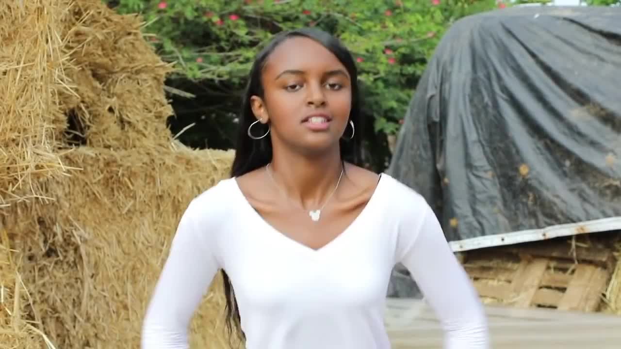 Cute Ethiopian girl dancing in Ethiopian way