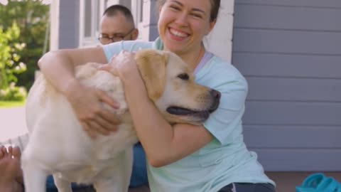 Lady Hugging a Dog