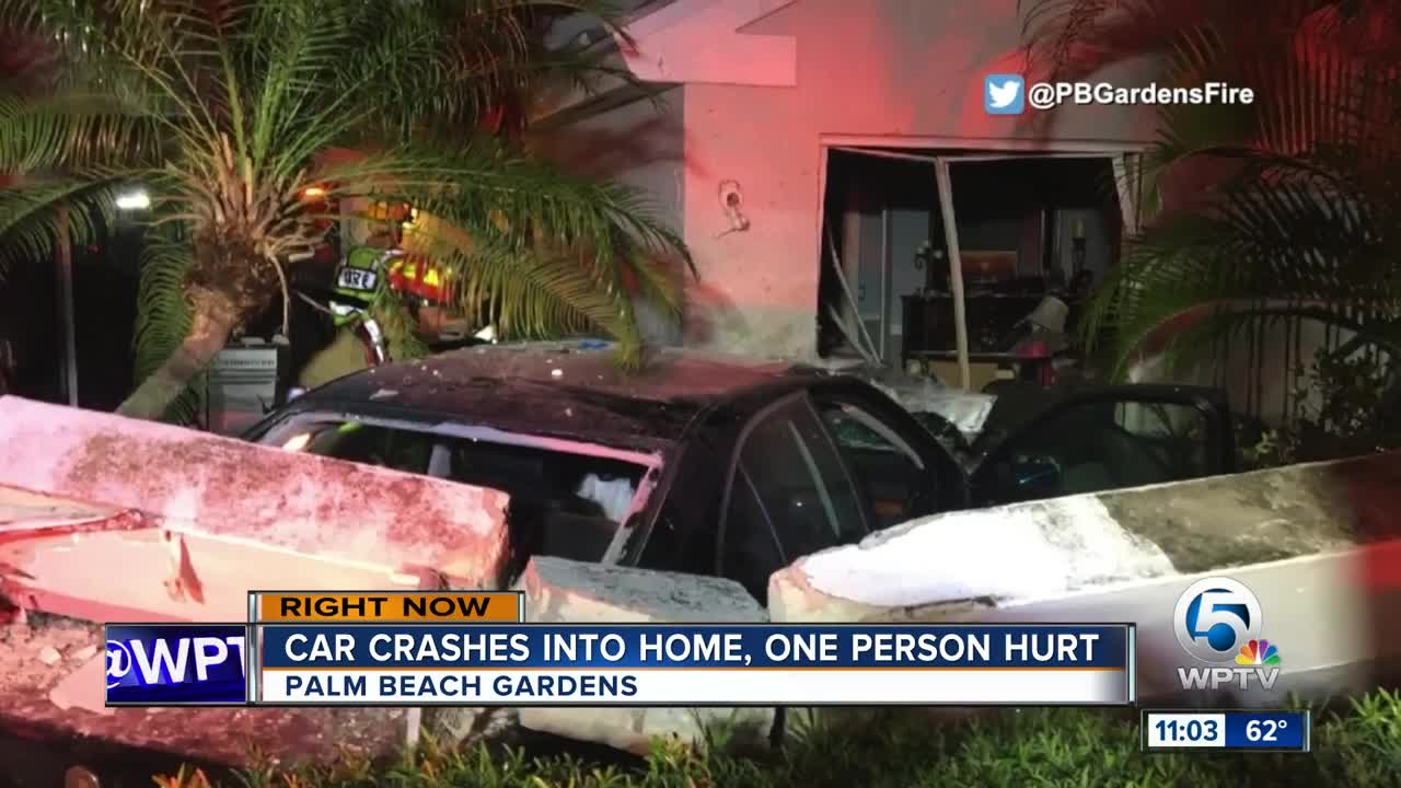 Car crashes into Palm Beach Gardens house; one person injured