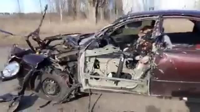 Warning: Sentive content: Russian army shoot randomly & kill an old couple who were driving home.