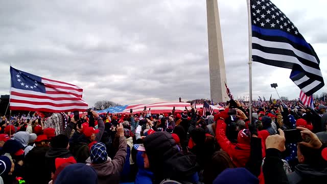 DC Jan 6th Large US Flag being spread out by Crowd