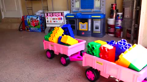 Lad and Niki Play with Colored Blocks