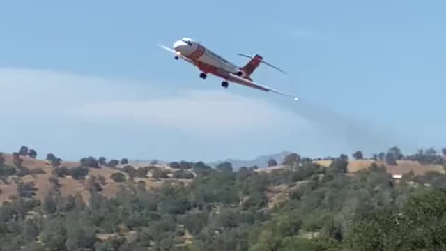 The firefighter pilot does an extremely low epic razor