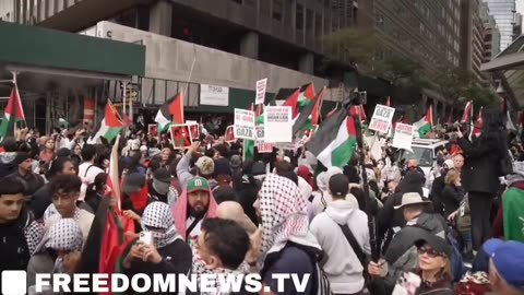 Hamas holds up Chinese and Soviet flags at UN