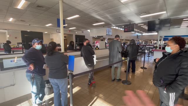Inside the DMV. Those only ones not wearing masks were Richard and the cop.