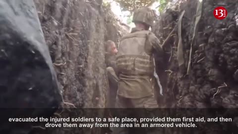 A Ukrainian soldier is dressing his wounds