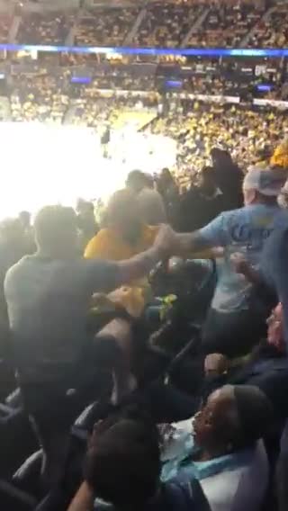 Woman goes VIRAL as she captures a WILD BRAWL at a hockey game