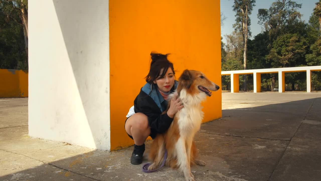 A woman hugging a dog