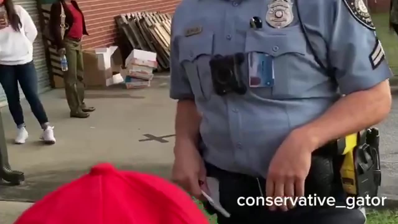 VOTER INTIMIDATION: Police threaten voters for wearing red hats that say MAKE AMERICA GREAT