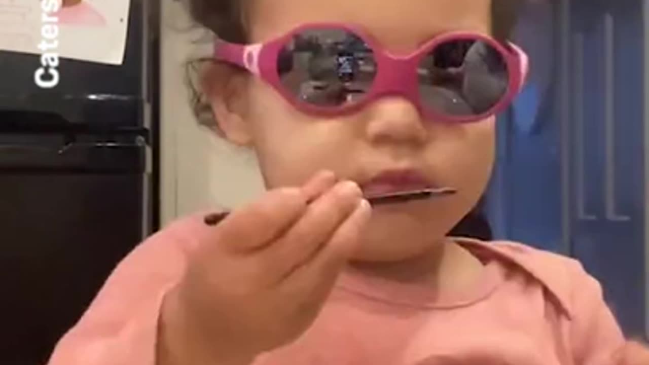 Adorable moment partially blind baby girl puts special glasses on for the first time