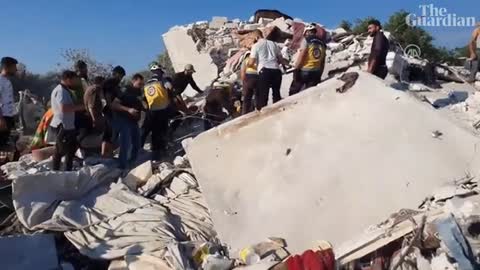 Syria_ Rescue workers clear rubble after Russian airstrike kills four siblings i