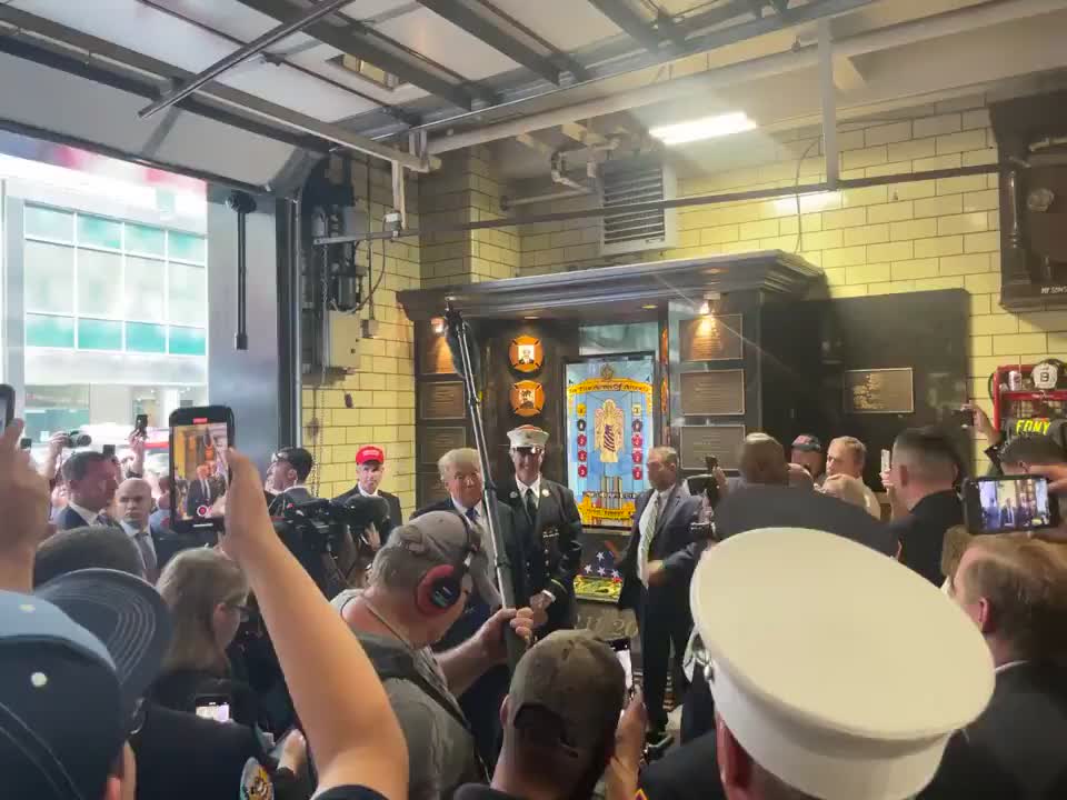 Trump meeting with FDNY firefighters in New York City on 9/11.