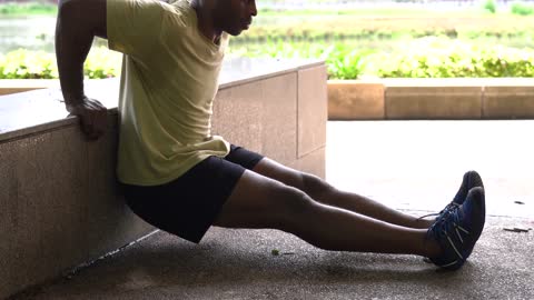 Man Doing Tricep Dip Exercise