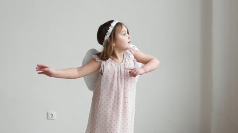 girl-with-angel-wings-spinning-around