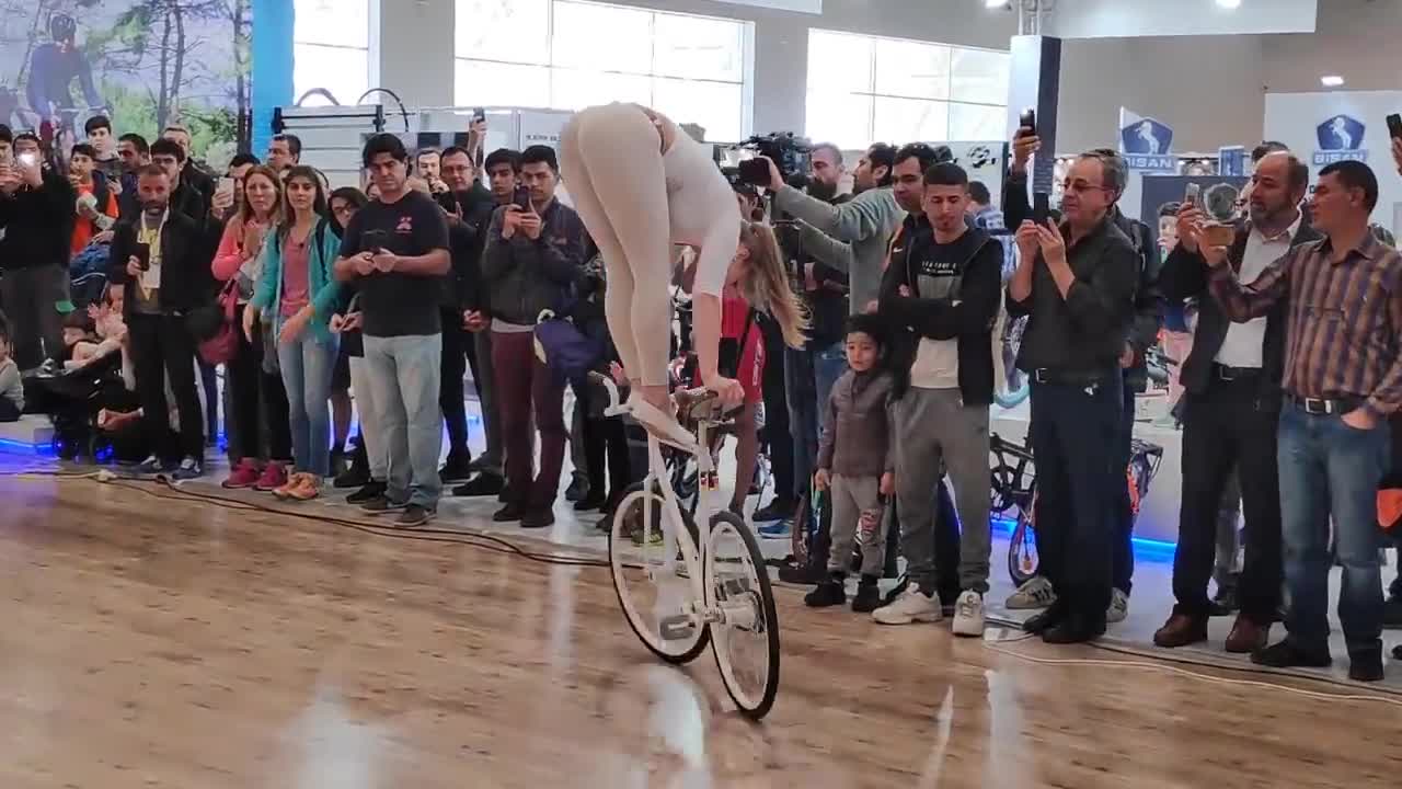 Girl Biker Performs - You Must See