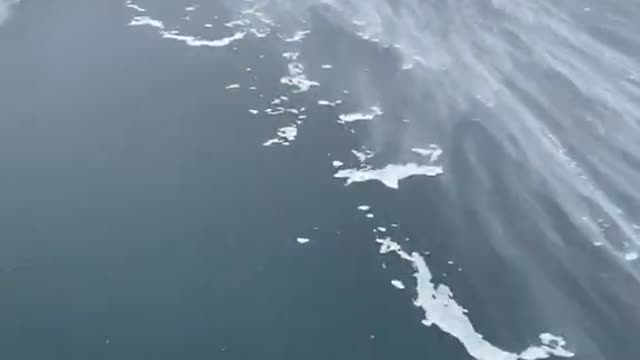 Wind Pushes Ice Fisherman Across Frozen Lake