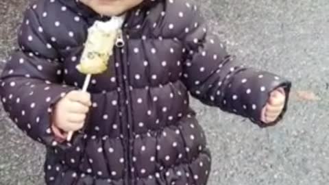 A child eating fish cake