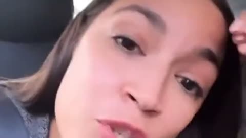 AOC Says Video of Her Wearing 'Invisible Handcuffs' is a 'Conspiracy Theory'