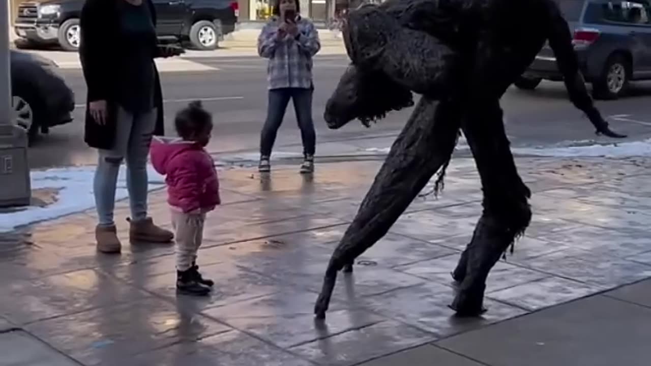 Cute kid unfazed by monster