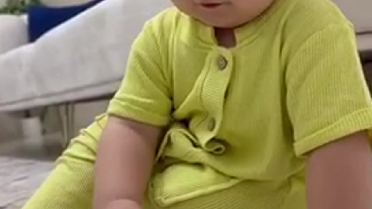 Cute baby playing with toy