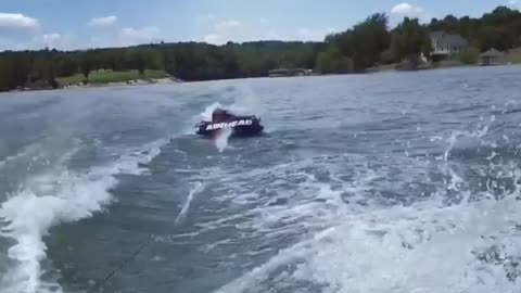 Collab copyright protection - tube pulled by boat flipped over