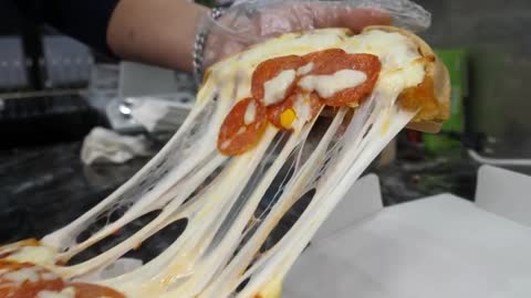 Pizza with a lot of cheese