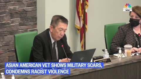 Asian american official shows military scars, condemn racist violence