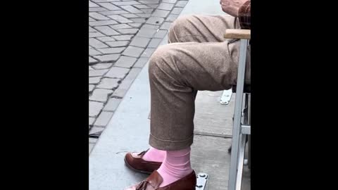 The old man in the pink socks