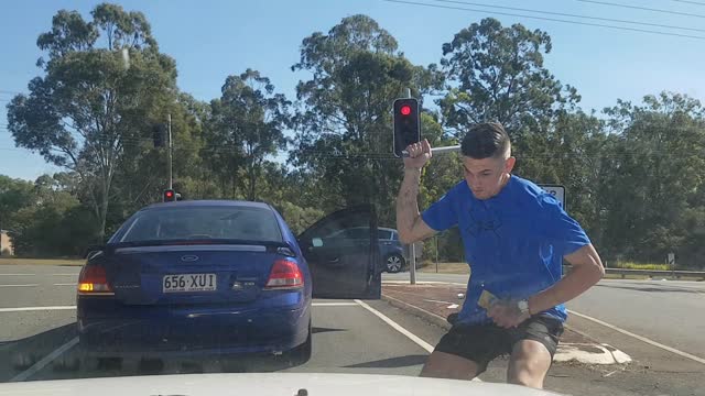 Headlight Smashed by Pole Wielding Motorist