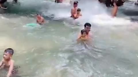 Bathing in Binh Chau stream