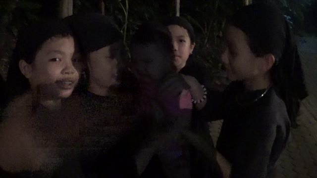 Funny children in Vietnam forest night