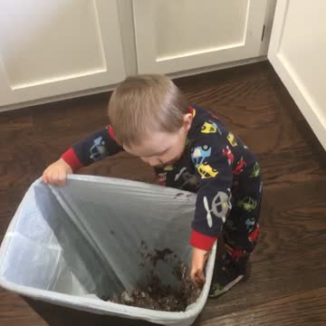 Tot Boy Eats Pudding Out Of Brand New Trash Bag
