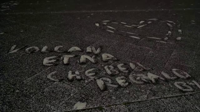 Streets covered in ash from Mount Etna eruption