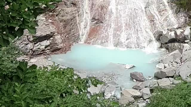 A beautiful waterfall deep in the mountains