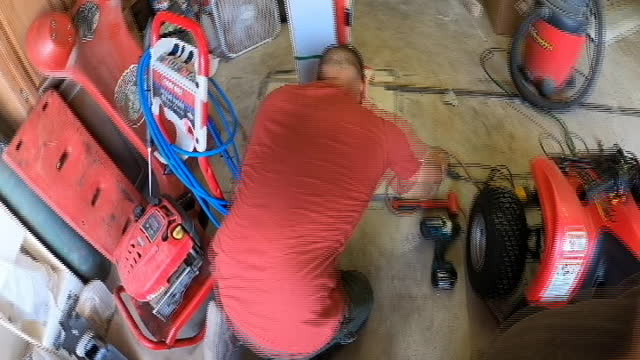 Assembly of a low profile 2 post car lift.