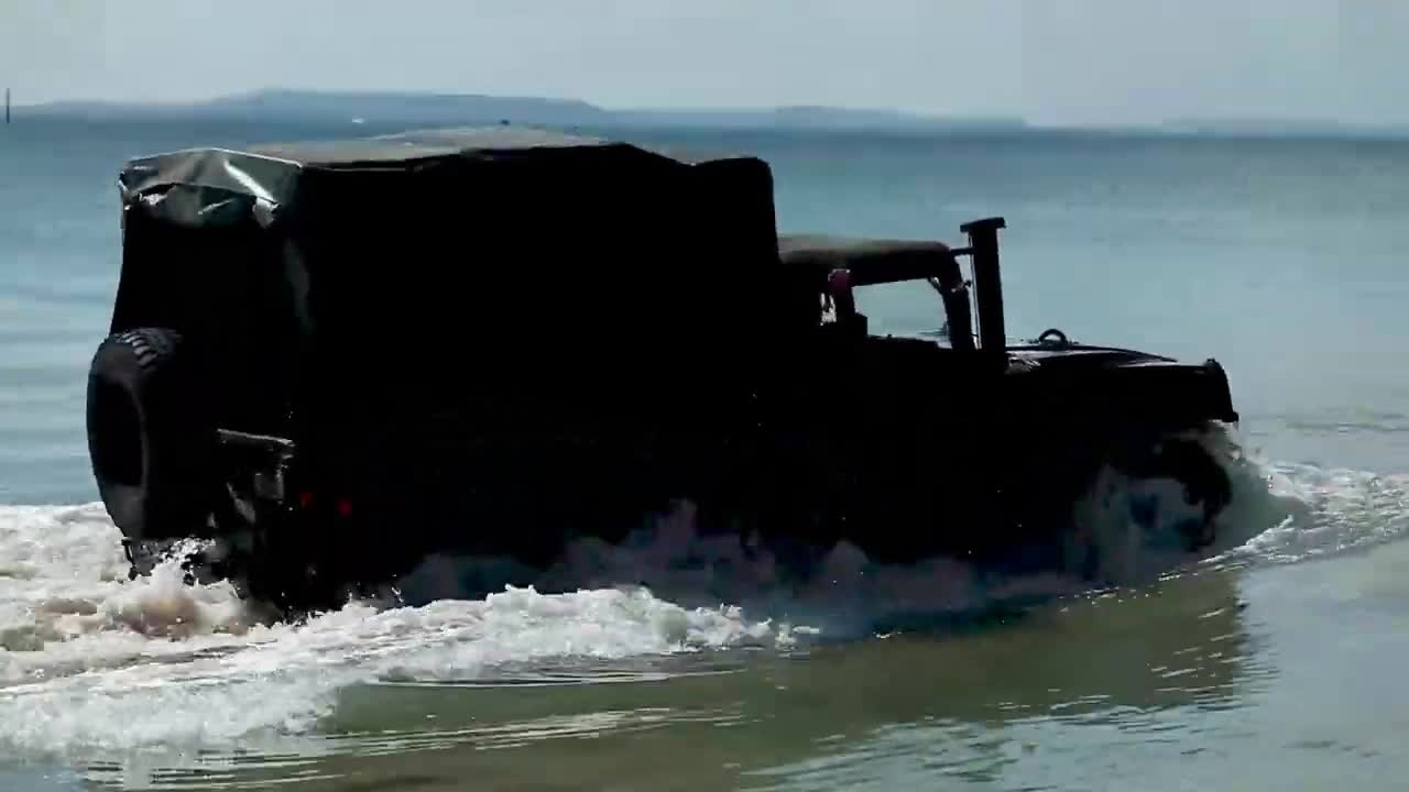 U.S. Marines with CLR-37 conduct deep water fording