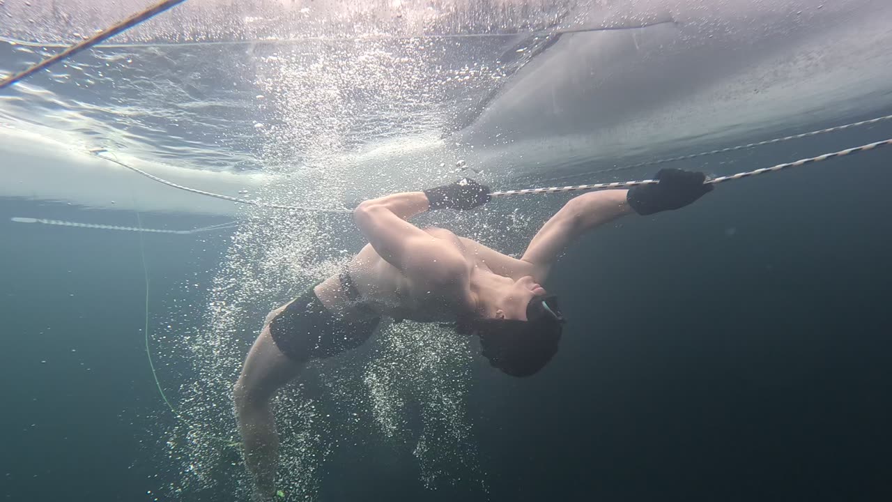 Ten meter DIVE UNDER THE ICE in freezing water