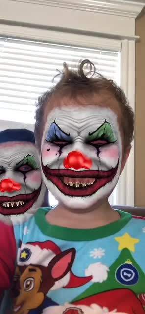 Loveable Toddler Smashes face into camera when using Facebook filters.
