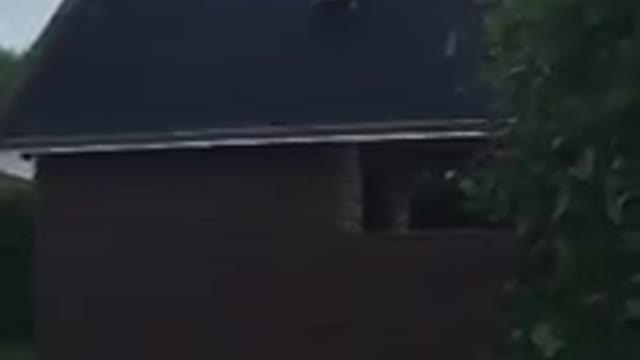 Boy skateboard shed kick fall off