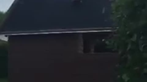 Boy skateboard shed kick fall off