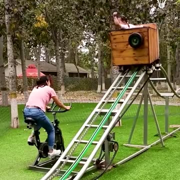 Mom works out while daughter has some fun in the playground