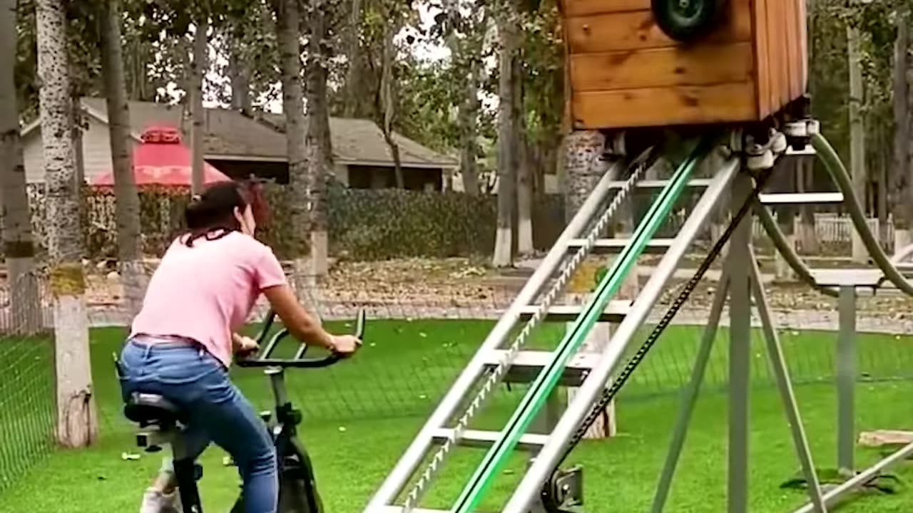 Mom works out while daughter has some fun in the playground