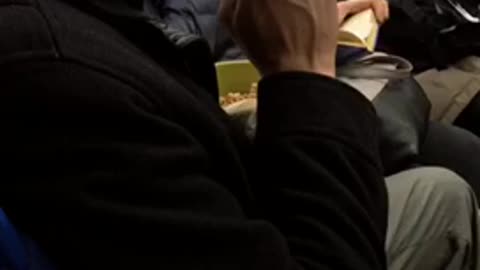 Bruh man on subway eats cereal out of green bucket