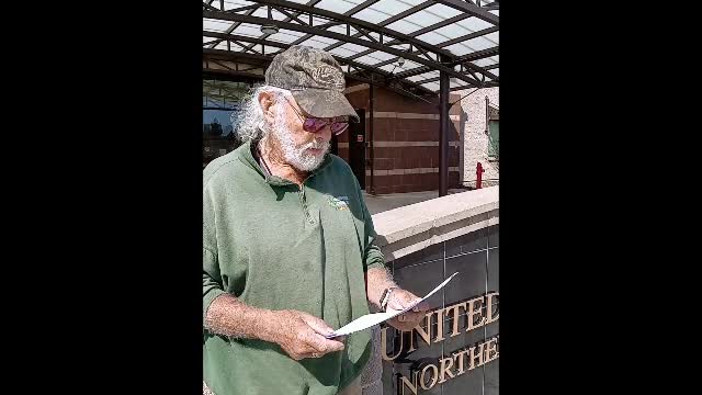 John D. reading the New California State grievance at the Humboldt County Federal Courthouse