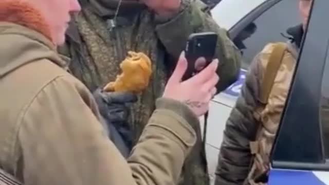 Russian soldier surrenders to Ukrainians