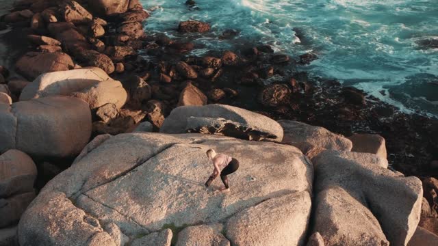 BEAUTIFUL LADY IN OUTDOOR YOGA EXERCISE